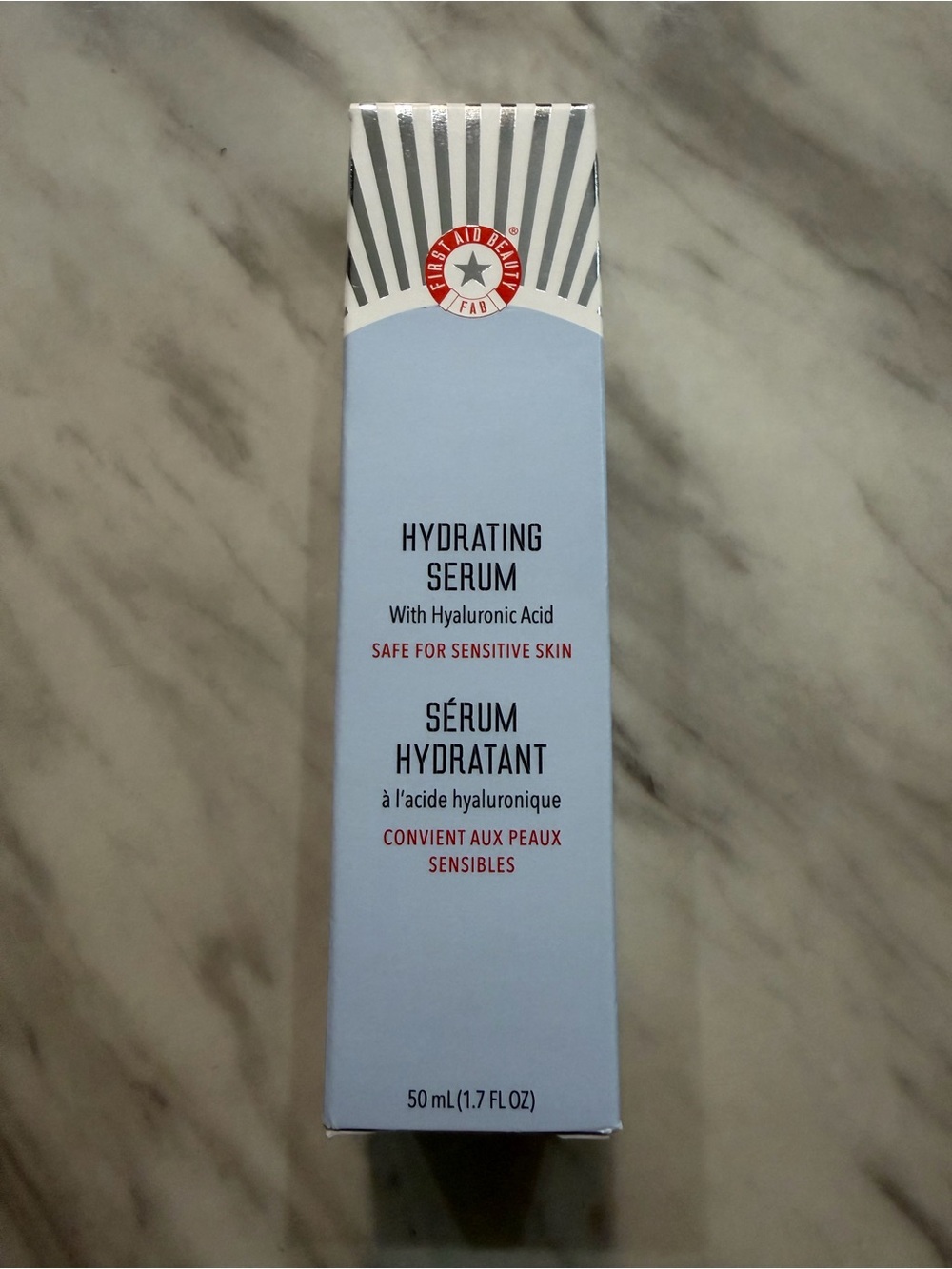 First Aid Beauty Hydrating Serum Light Blue and Red Accents